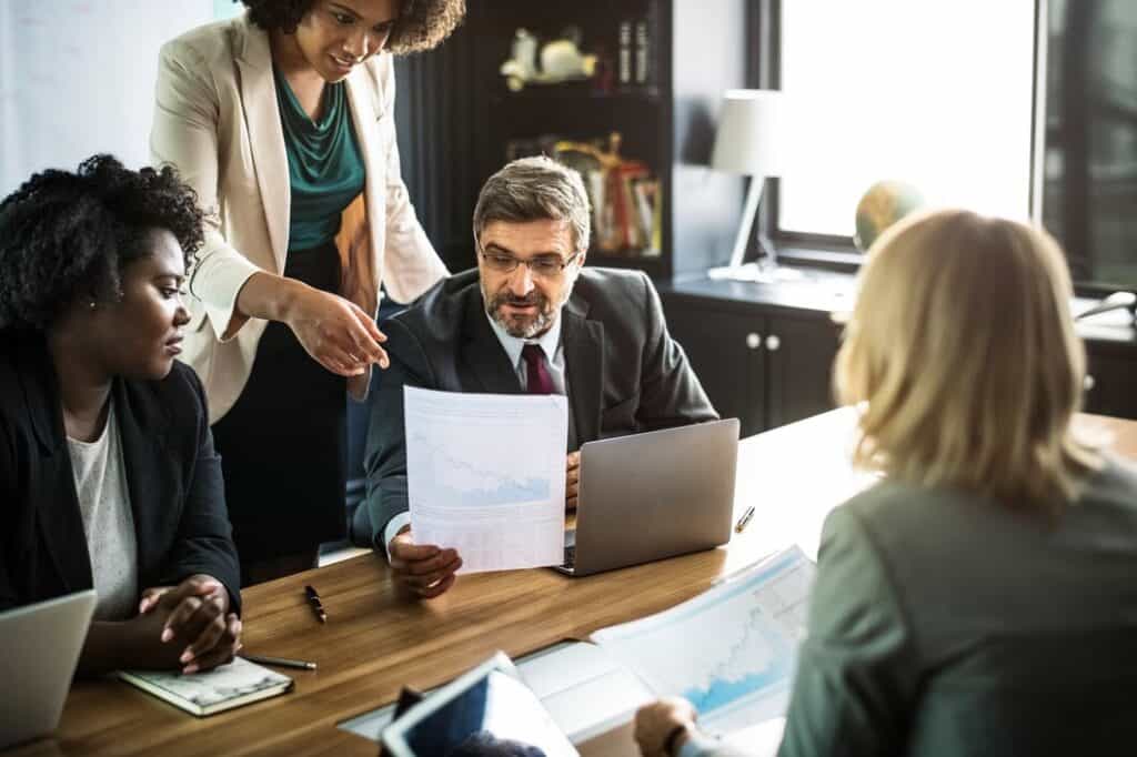 Arizona attorney providing legal support and reviewing documents with a client