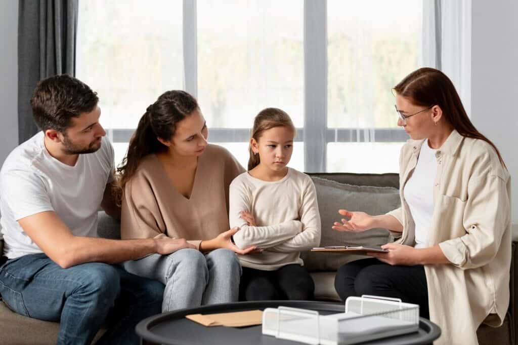 Family law attorney discussing divorce and child custody matters with clients